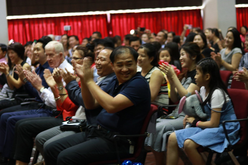 A round of applause from parents.