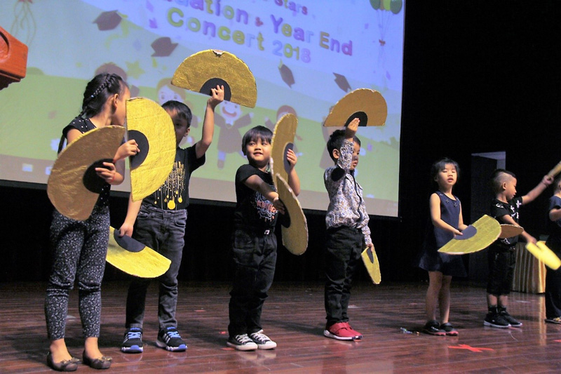 K1 children performing the Fan dance and It’s A Small World After All.