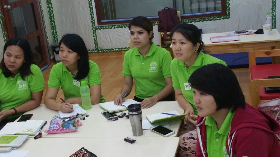 Teachers listening attentively during the training.